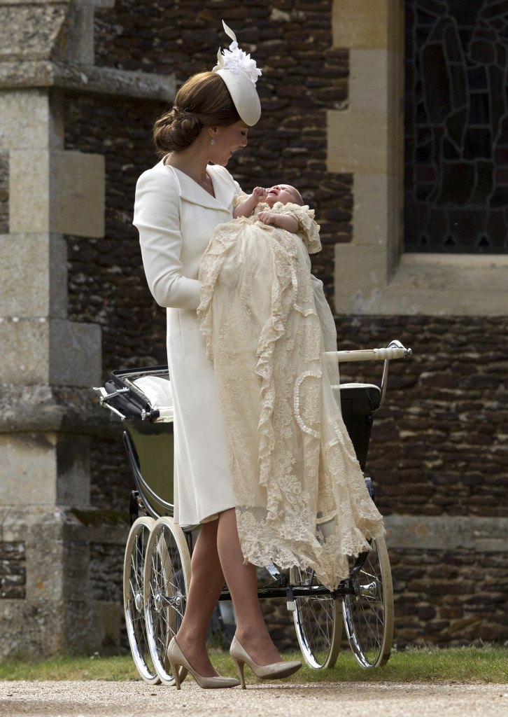 The Christening of Princess Charlotte at The Church of St Mary Magdalene, Sandringham, Norfolk, UK on the 5th July 2015. Picture by Matt Dunham/WPA-Pool Pictured: Duchess of Cambridge, Catherine, Kate Middleton, Princess Charlotte Ref: SPL1068799 050715 Picture by: Splash News Splash News and Pictures Los Angeles:310-821-2666 New York:212-619-2666 London: 870-934-2666 photodesk@splashnews.com 