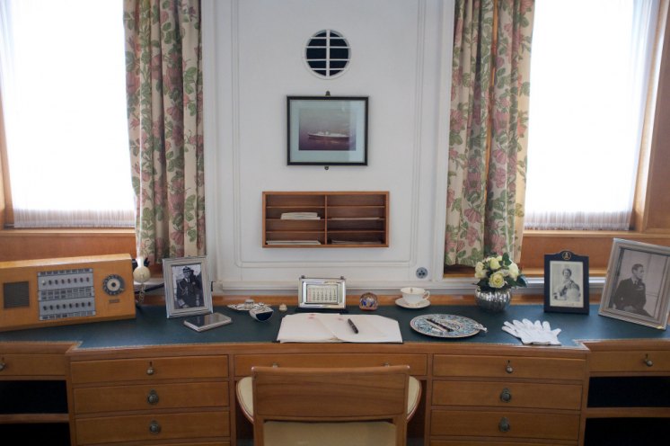 How shoudl you write to a member of the Royal Family? The Queen's desk aboard Britannia
