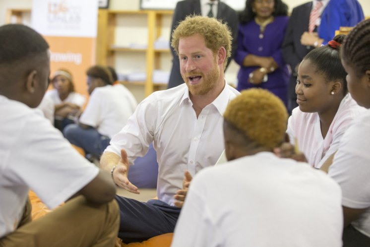 Prince Harry meets students at a school in Soweto near Johannesburg. Picture by i-Images/